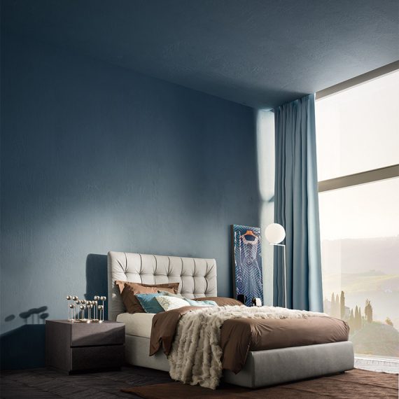 Camera da letto color blu e marrone